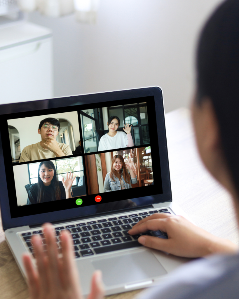 Woman having a video conference call with her diverse and multicultural team to address needs of their company